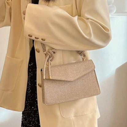 Cartera Brillante Color Dorado Con Nudos