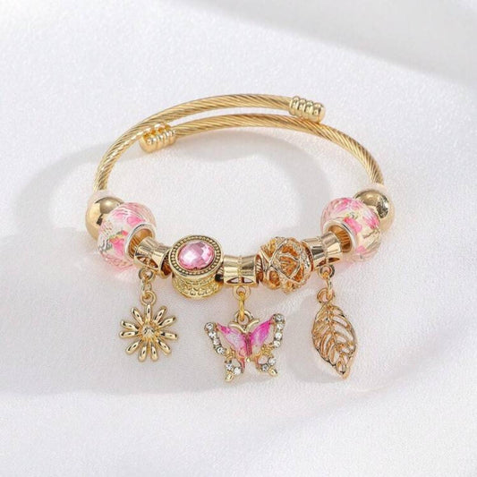Pulsera Con Dijes / Charms Dorados y Rosados de Mariposa, Girasol y Pulma