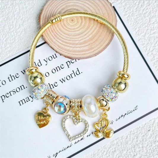 Pulsera Con Dijes / Charms Dorados Corazones y Cisnes...