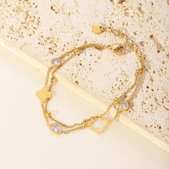 Pulsera Doble Con 2 Tréboles De 4 Hojas Distintos y 3 Circonitas