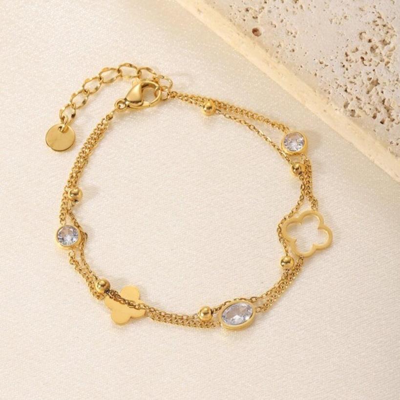 Pulsera Doble Con 2 Tréboles De 4 Hojas Distintos y 3 Circonitas